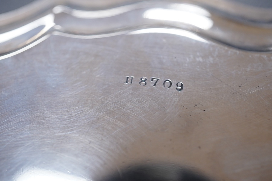 A George V silver salver, by James Deakin & Sons Ltd, Sheffield, 1922, 20.5cm, with pie crust border, on four scroll feet, 11.9oz.